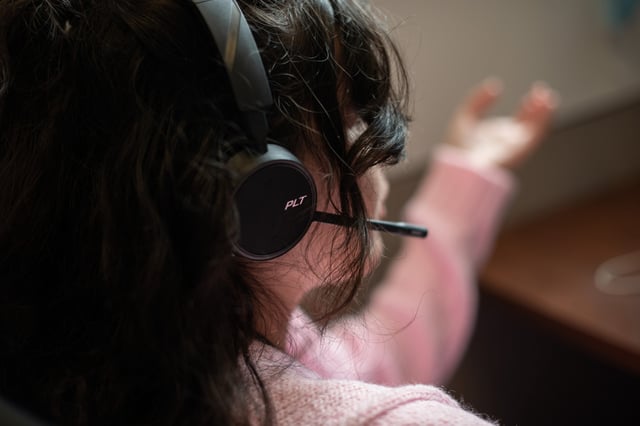Isabella Rowe takes a phone call at the Harris Center for Mental Health in Houston, on March 7, 2022.