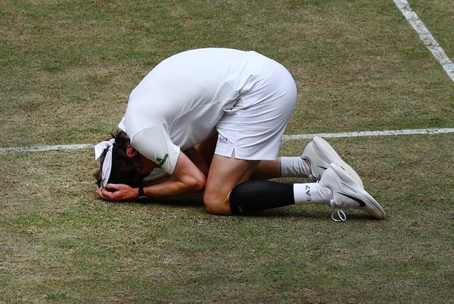 Tennis - Halle Open - OWL Arena, Halle, Germany - June 22, 2025 Kazakhstan's Alexander Bublik celebrates after winning the final against Russia's Daniil Medvedev REUTERS/Leon Kuegeler