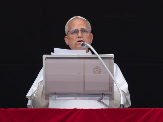 VATICAN CITY, VATICAN - JUNE 22: (EDITOR NOTE: STRICTLY EDITORIAL USE ONLY - NO MERCHANDISING). Pope Leo XIV delivers his Angelus blessing on the Solemnity of Corpus Christi from the window of his studio overlooking St. Peter's Square on June 22, 2025 in Vatican City, Vatican. The Pope said the cry for peace “demands responsibility and reason and must not be drowned out by the roar of weapons or by rhetorical words that incite conflict.” Pope Leo urged every member of the international community to take up their moral responsibility to “stop the tragedy of war before it becomes an irreparable abyss.” The Holy Father’s words came just hours after US bombers struck nuclear sites in Iran, as Israel and Iran carry out strikes on each other’s territory. (Photo by Mario Tomassetti - Vatican Media via Vatican Pool/Getty Images)