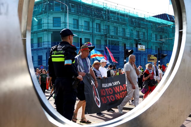 People take part in a march against the upcoming NATO leaders' summit, at The Hague, Netherlands, June 22, 2025. REUTERS/Piroschka van de Wouw