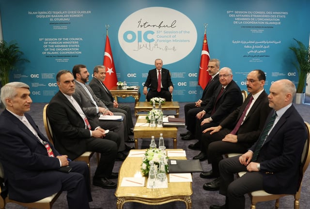 Turkey's President Tayyip Erdogan meets with Iranian Foreign Minister Abbas Araghchi as they are flanked by Turkish Foreign Minister Hakan Fidan and members of Turkish and Iranian delegations, during the 51st Session of the Council of Foreign Ministers of the Organisation of Islamic Cooperation (OIC), in Istanbul, Turkey, June 21, 2025. Murat Cetinmuhurdar/PPO/Handout via REUTERS/File Photo