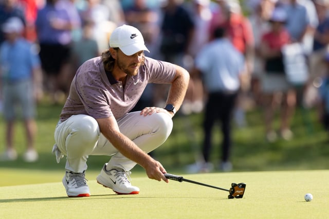 Tommy Fleetwood lines up a putt on the 15th green during the third round of the 2025 Travelers Championship at TPC River Highlands in Cromwell, Connecticut.