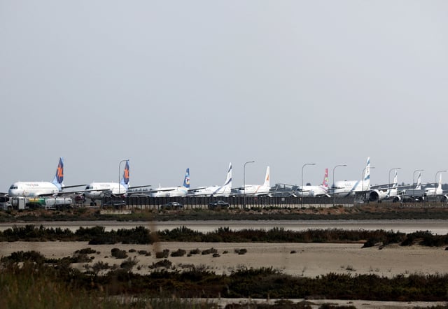 Aircraft belonging to Israel's state carrier El Al and Israir among other airlines, are parked at Larnaca International Airport, in Larnaca, Cyprus June 16, 2025. REUTERS/Yiannis Kourtoglou/File Photo