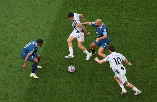 Soccer Football - FIFA Club World Cup - Group G - Juventus v Wydad Casablanca - Lincoln Financial Field, Philadelphia, Pennsylvania, U.S. - June 22, 2025 Juventus' Andrea Cambiaso and Kenan Yildiz in action with Wydad Casablanca's Nordin Amrabat and Fahd Moufi IMAGN IMAGES via Reuters/Caean Couto