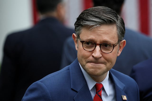 U.S. House of Representatives Speaker Mike Johnson (R-LA) looks on, after President Donald Trump delivered remarks on tariffs, in the Rose Garden at the White House in Washington, D.C., U.S., April 2, 2025. REUTERS/Leah Millis/File Photo