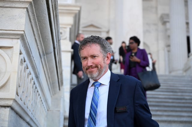 US Representative Thomas Massie, Republican of Kentucky, arrives to speak to the press outside the US Capitol after the House passed legislation to fund the government through September 30 and avert a shutdown at the end of the week.