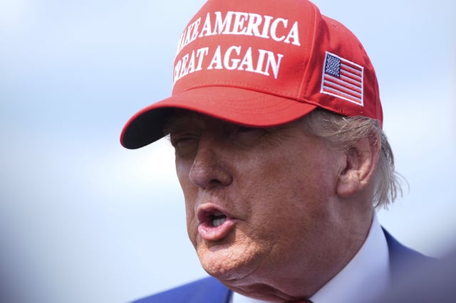 President Donald Trump speaks with reporters upon arriving at Morristown Municipal Airport in Morristown, N.J., Friday, June 20, 2025.