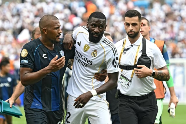Real Madrid defender Antonio Rudiger (centre) leaves the field after complaining of being racially abused following the Spanish giants' win over Mexican side Pachuca