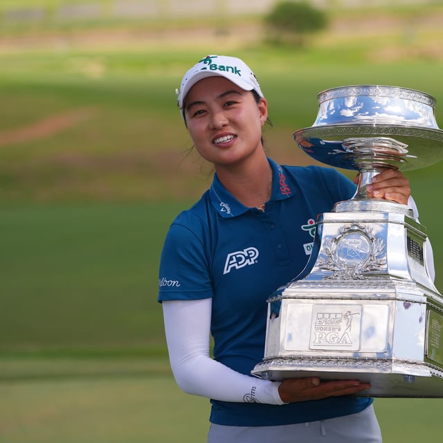 Minjee Lee poses with the trophy after winning the Women's PGA Championship golf tournament Sunday, June 22, 2025, in Frisco, Texas. (AP Photo/LM Otero)