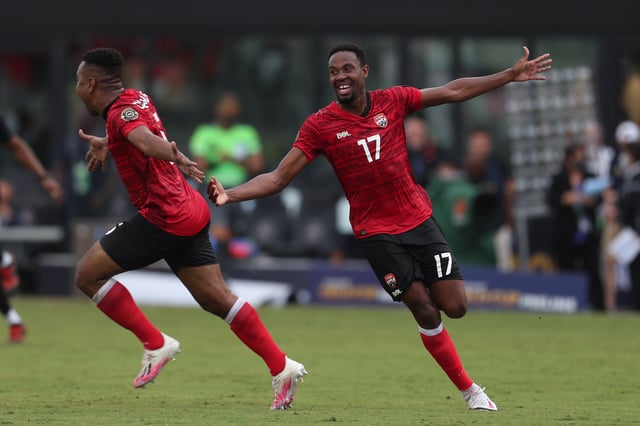 Justin Garcia #17 of Trinidad &amp; Tobago celebrates with his teammates after winning in penalties shootout against French Guiana as part of CONCACAF Gold Cup 2021 preliminaries at DRV PNK Stadium on July 6, 2021 in Fort Lauderdale, Florida.