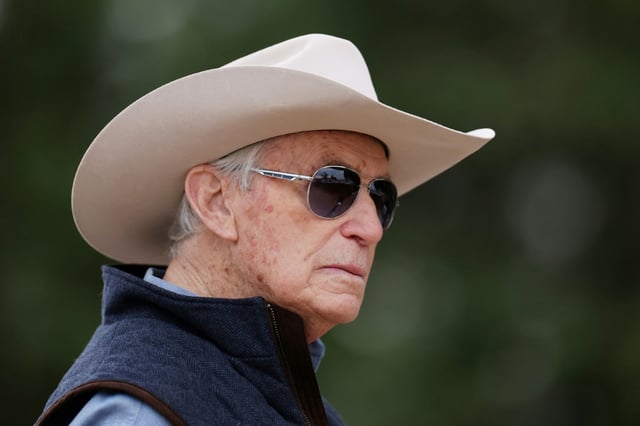 Trainer D. Wayne Lukas watches morning workouts before the 2025 Kentucky Derby