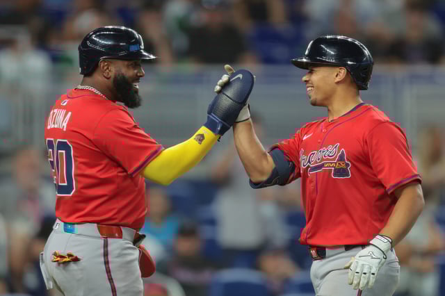 MIAMI, FLORIDA - JUNE 21: Drake Baldwin #30 of the Atlanta Braves celebrates with Marcell Ozuna #20 after hitting a three-run home run against the Miami Marlins during the ninth inning at loanDepot park on June 21, 2025 in Miami, Florida.