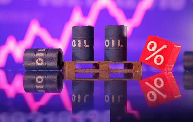 Miniatures of oil barrels and a rising stock graph are seen in this illustration taken January 15, 2024. REUTERS/Dado Ruvic/Illustration/File Photo