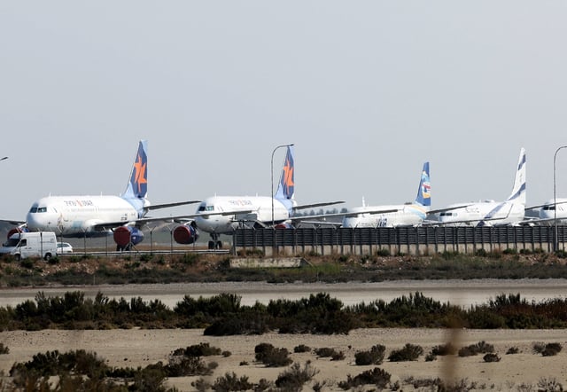 Aircraft belonging to Israel's state carrier El Al and Israir among other airlines, are parked at Larnaca International Airport, in Larnaca, Cyprus June 16, 2025. REUTERS/Yiannis Kourtoglou/File Photo