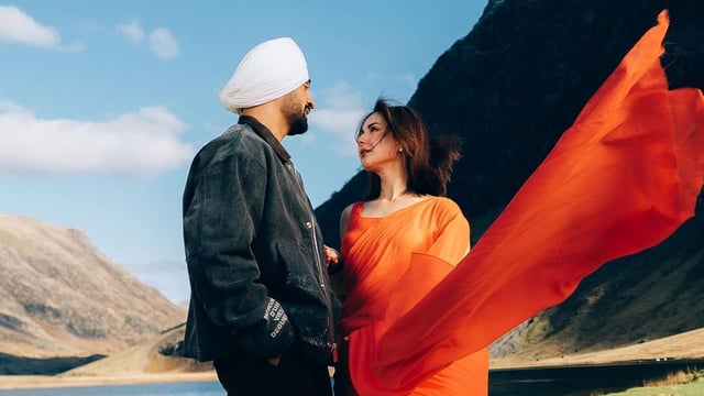 Diljit Dosanjh and Pakistani actor Hania Aamir in a still from Sardaar Ji 3 trailer.