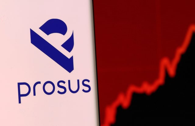 Prosus' logo is pictured on a smartphone in front of the stock graph displayed in this illustration taken, December 4, 2021. REUTERS/Dado Ruvic/Illustration/File Photo