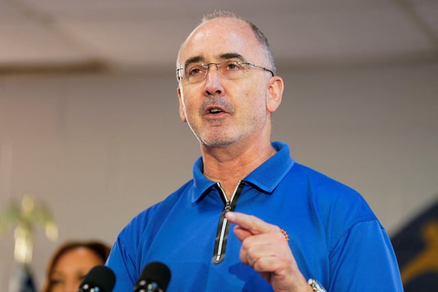 United Auto Workers (UAW) President Shawn Fain speaks during a campaign event at the United Auto Workers (UAW) Local 900 in Wayne, Michigan, U.S., August 8, 2024. REUTERS/Elizabeth Frantz/File Photo