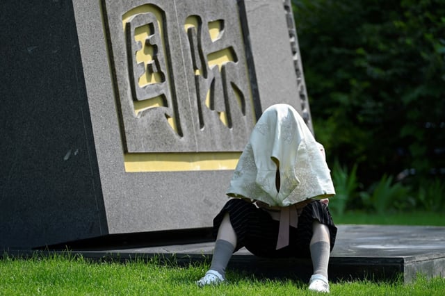 China's capital Beijing issued its second-highest heat warning as temperatures reached the hottest so far this year