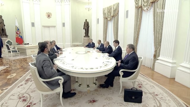 Russian President Vladimir Putin and Iranian Foreign Minister Abbas Araqchi attend a meeting in Moscow, Russia June 23, 2025, in this still image taken from video. Kremlin.ru/Handout via REUTERS