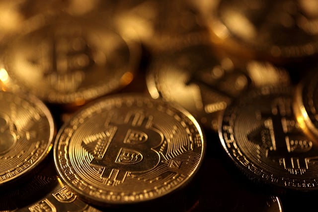 Representations of cryptocurrency Bitcoin are seen in this illustration taken November 25, 2024. REUTERS/Dado Ruvic/Illustration/File Photo