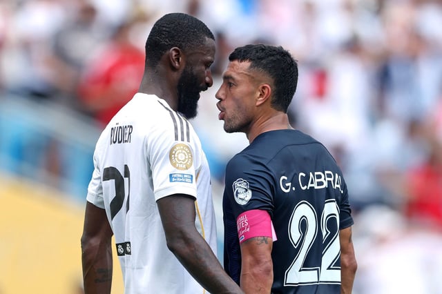 Antonio (left) and Gustavo Cabral (right) clash during the Real Madrid vs. Pachuca game at the FIFA Club World Cup.