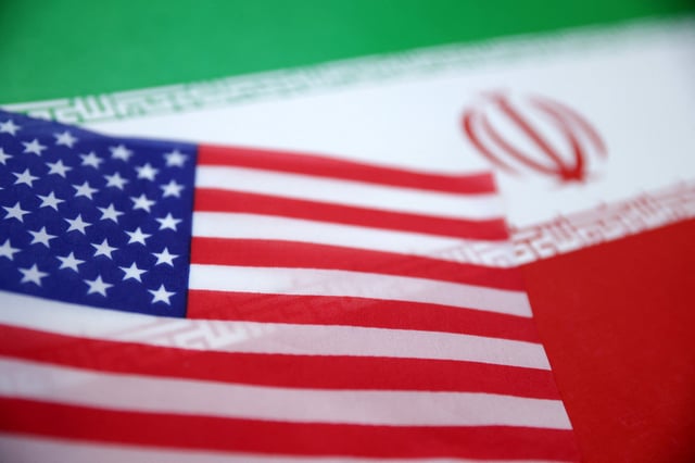 U.S. and Iran flags are seen in this illustration taken June 18, 2025. REUTERS/Dado Ruvic/Illustration/File photo