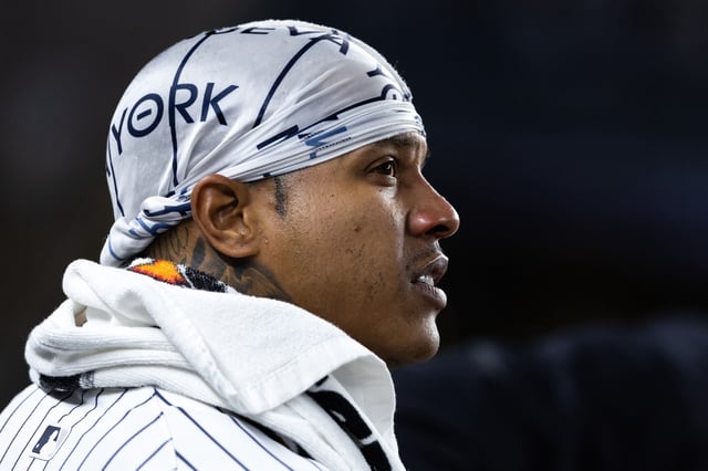 NEW YORK, NEW YORK - SEPTEMBER 10: Marcus Stroman #0 of the New York Yankees looks on from the dugout during the fifth inning of the game against the Kansas City Royals at Yankee Stadium on September 10, 2024 in New York City. (Photo by Dustin Satloff/Getty Images)