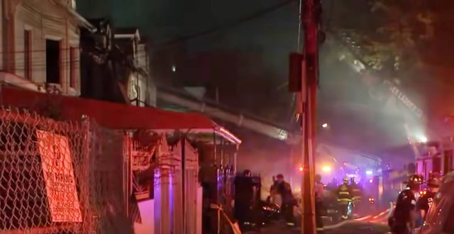 The fire started just past 7:20 p.m. Sunday in a multi-family on Devoe Terrace near W. 190th St. in University Heights. (Eyewitness News ABC7NY)