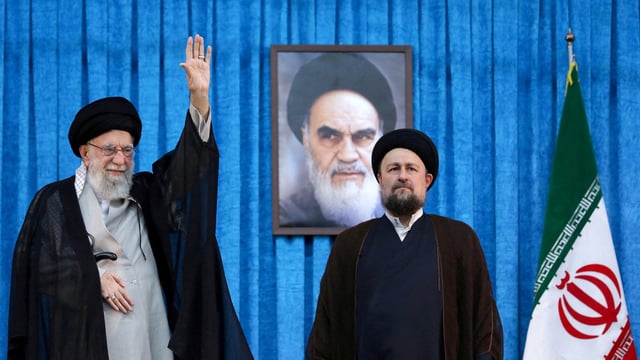 File image: Ayatollah Ruhollah Khomeini's grandson, Hassan Khomeini stands next to Iran's Supreme Leader Ayatollah Ali Khamenei 