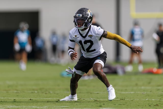 Travis Hunter #12 of the Jacksonville Jaguars works out during a Jacksonville Jaguars mandatory minicamp at Miller Electric Center on June 10, 2025 in Jacksonville, Florida.