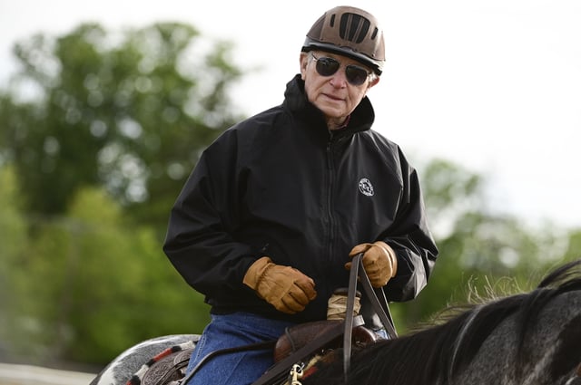 May 12, 2021; Baltimore, MD, USA;  Hall of fame trainer D. Wayne Lukas  rides during morning work out at Pimlico Race Course. Mandatory Credit: Tommy Gilligan-USA TODAY Sports