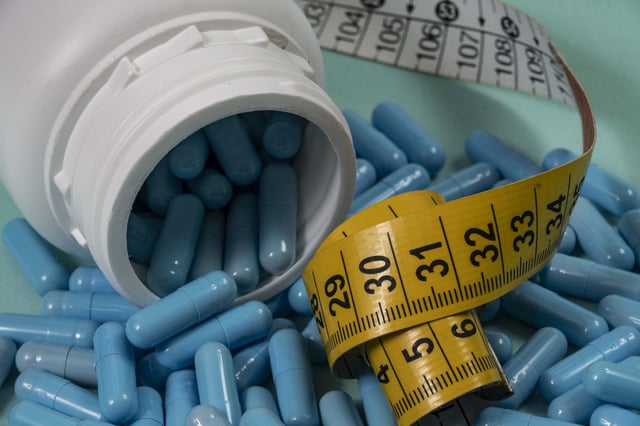 Stock image of weight loss pills.