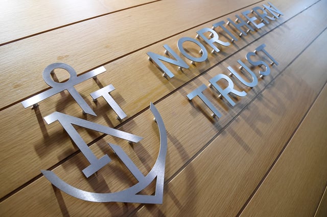 A company logo is seen at Northern Trust offices in London, Britain August 1, 2019. Picture taken August 1, 2019. REUTERS/Toby Melville/File Photo