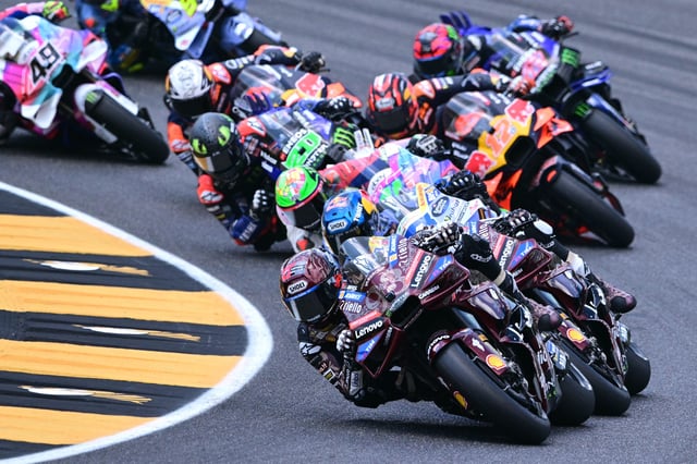 Ducati Lenovoi Team&#39;s Spanish MotoGP rider Marc Marquez steers his motorbike ahead of the pack during the Italian Moto GP Grand Prix at Mugello circuit, in Mugello, near Florence, on June 22, 2025.