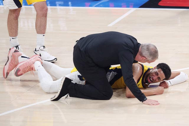 OKLAHOMA CITY, OKLAHOMA - JUNE 22: Tyrese Haliburton #0 of the Indiana Pacers sustains an injury during the first quarter against the Oklahoma City Thunder in Game Seven of the 2025 NBA Finals at Paycom Center on June 22, 2025 in Oklahoma City, Oklahoma.