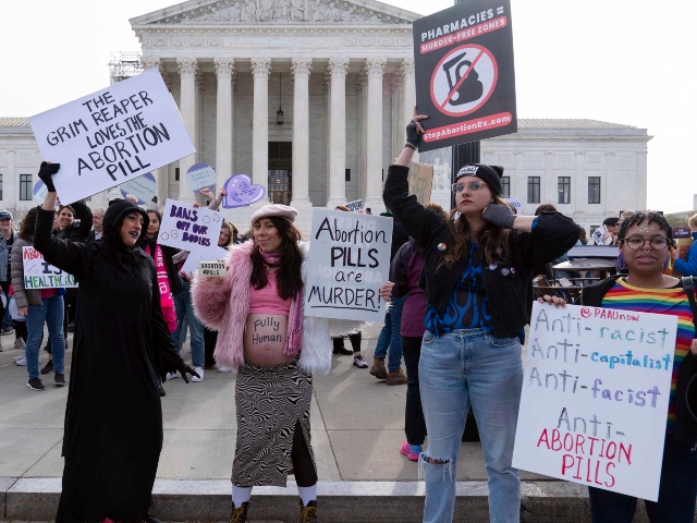 Pro-life demonstrators protest outside of the Supreme Court during a rally, March 26, 2024, in Washington. Two years after a leaked draft of a U.S. Supreme Court opinion singled that the nation's abortion landscape was about to shift dramatically, the issue is still consuming the nation's courts, legislatures and political campaigns and changing the course of lives. (Jose Luis Magana AP)