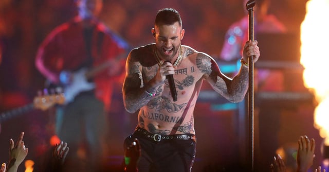 Maroon 5's Adam Levine goes shirtless during the Super Bowl LIII Halftime Show on Sunday at Mercedes-Benz Stadium in Atlanta.