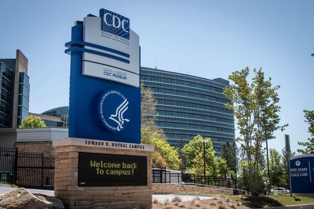 The entrance to the Centers for Disease Control and Prevention is seen, Tuesday, April 19, 2022, in Atlanta. A decision by a federal judge in Florida to throw out a national mask mandate for public transportation across the U.S. created a confusing patchwork of rules for passengers. The CDC recently extended the mandate, but the court decision put the mandate on hold. (AP Photo/Ron Harris)