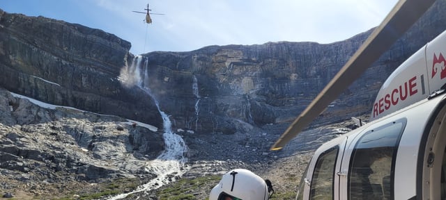 A rescue helicopter at the rock slide site near Bow Lake on Friday, June 20, 2025.