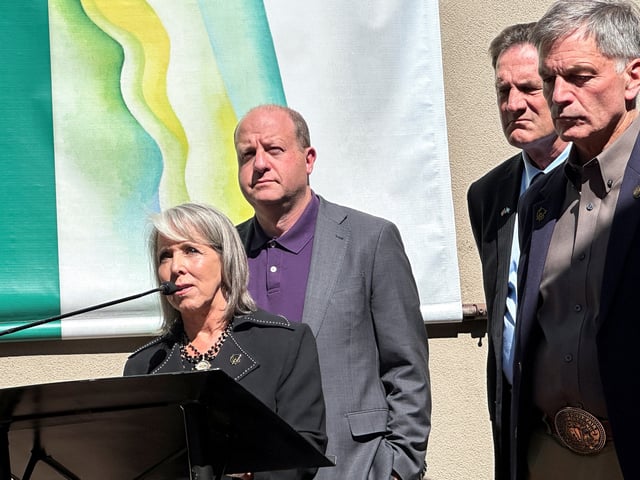 New Mexico's Governor Michelle Lujan Grisham speaks at a meeting of Western U.S. governors, flanked by Colorado Governor Jared Polis, South Dakota Governor Larry Rhoden and Wyoming Governor Mark Gordon, in Santa Fe, New Mexico, U.S., June 23, 2025. REUTERS/Andrew Hay