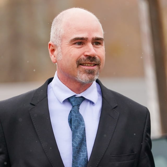 Ruben Manz, a chiropractor accused of sexually assaulting seven women over the span of 10 years, walks near Court of King's Bench in Regina on Tuesday, Nov. 5, 2024. THE CANADIAN PRESS/Heywood Yu