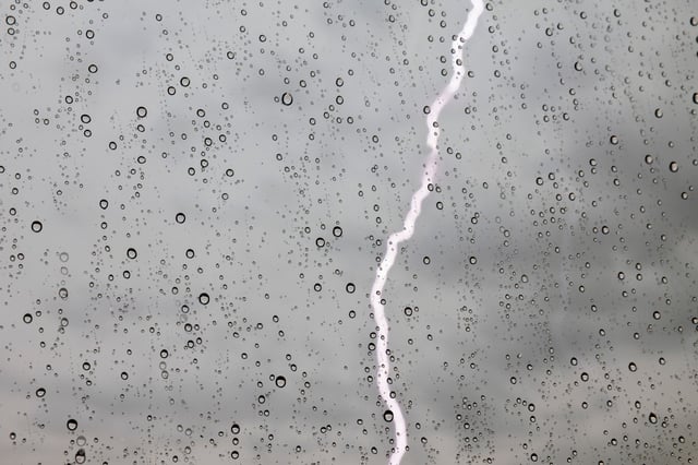 A lightning bolt strikes in Denver on Thursday, June 22, 2023.  (Photo by Grace Smith/The Denver Post)