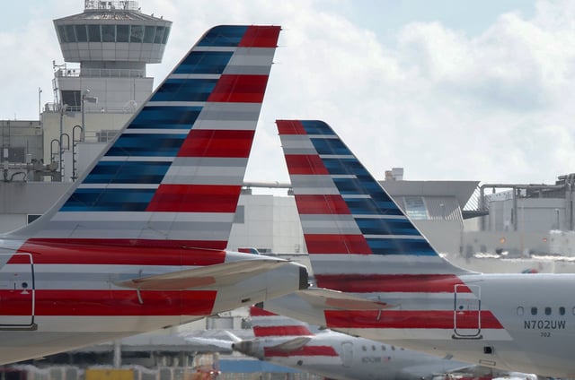 MIAMI, FLORIDA - FEBRUARY 19: American Airlines planes on the tarmac at the Miami International Airport on February 19, 2025 in Miami, Florida. The carrier announced that it is adding two new routes from LGA servicing two cities in South Carolina: Charleston and Myrtle Beach. (Photo by Joe Raedle/Getty Images)