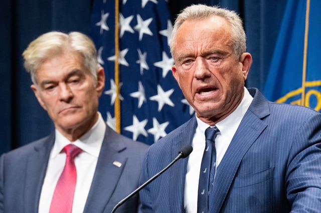 Medicare and Medicaid Administrator Mehmet Oz and Secretary of Health and Human Services Robert F. Kennedy Jr. during a news conference to discuss health insurance in Washington on June 23, 2025. 