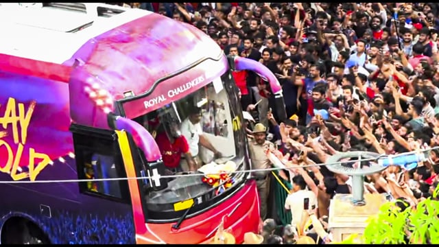 Fans wave as a bus carrying the IPL 2025 winning Royal Challengers Bengaluru team arrives at the Chinnaswamy Stadium, in Bengaluru, Karnataka, Wednesday, June 4, 2025. (PTI)