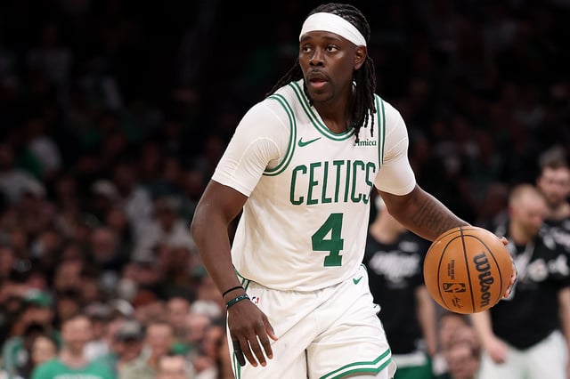 rue Holiday #4 of the Boston Celtics dribbles against the Orlando Magic in Game One of the Eastern Conference First Round NBA Playoffs at TD Garden on April 20, 2025 in Boston, Massachusetts.