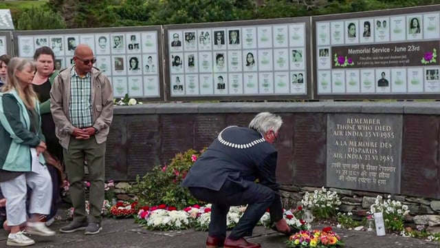 A man lays a wreath as he pays tribute to the victims on the 40th anniversary of Air India Flight 182 Kanishka bombing, at the Ahakista Memorial in Cork on Monday. (ANI Video Grab)
