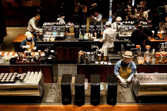 Baristas at work at a Starbucks Reserve Roastery in Shanghai. Photo: Reuters