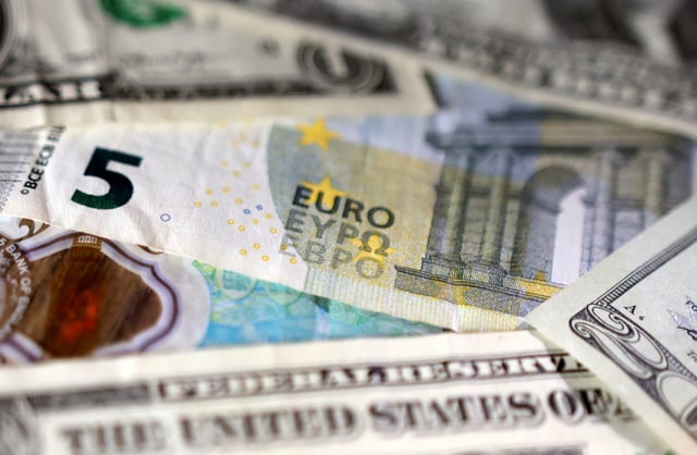 Euro and U.S. dollar banknotes are seen in this illustration taken May 4, 2025. REUTERS/Dado Ruvic/Illustration/File Photo