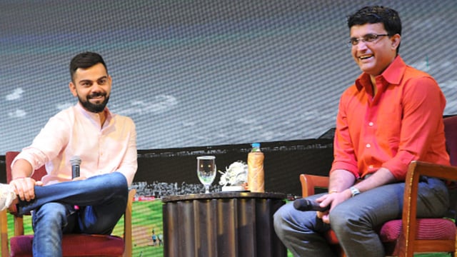 Virat Kohli, left, and Sourav Ganguly share a laugh during an event in 2018